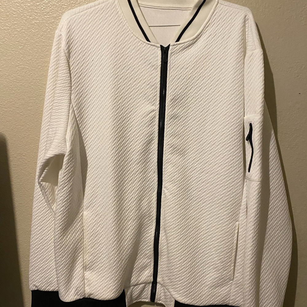 White Windbreaker with Textured Fabric and Stand-Up Collar